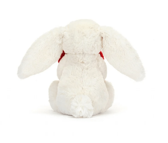 doudou lapin jellycat avec un coeur rouge vue de dos sur fond blanc