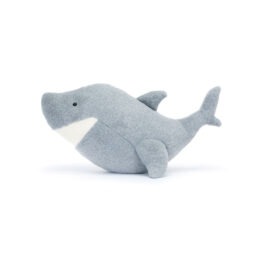 un doudou requin Jellycat, vue de côté sur fond blanc