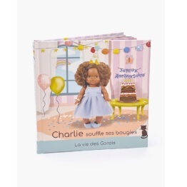 un livre "Charlie souffle ses bougies" Minikane, vue de face sur fond blanc